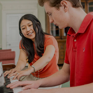 students playing the piano