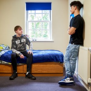 boys in their dorm room