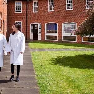 students wearing lab coat