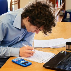 a student doing his maths work