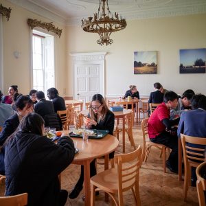 Students working in the lunch hall