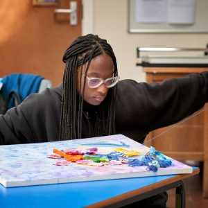 a girl stitching