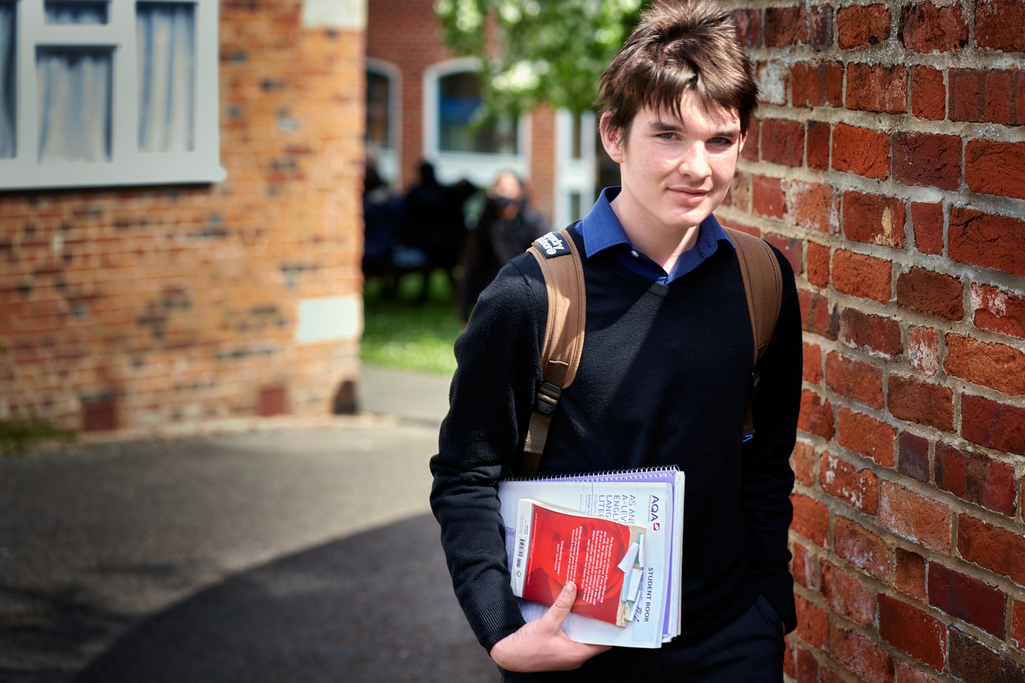 student with books