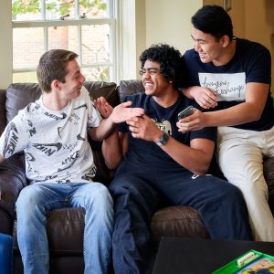 boys relaxing in their dorm space