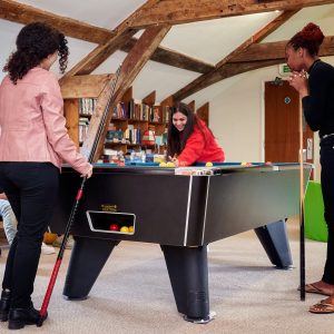 students playing pool