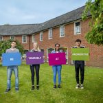 Be Yourself at Padworth - students holding signs up to show a message