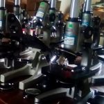 Microscopes being donated to a school in Uganda